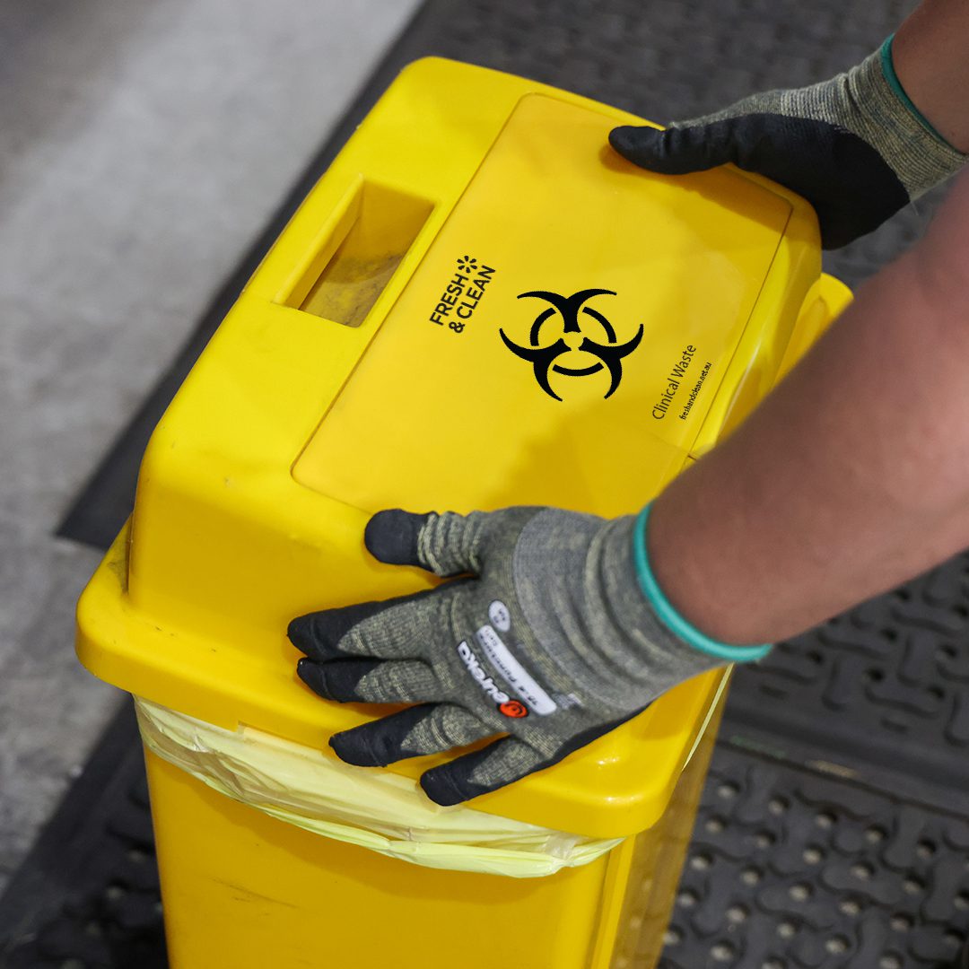 Fresh & Clean Clinical Waste Bin - A Techinician is opening the bin to check for waste,